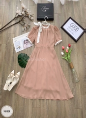Váy cổ tròn hở vai đính nơ chân xòe