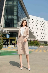 Chân váy dài bổ mảnh rút rua gấu