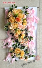 Bảng hoa xe dâu màu cam nơ hồng
