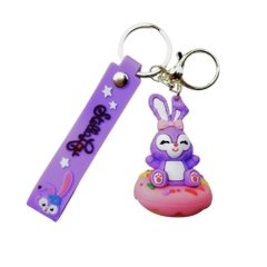 Móc khóa thỏ tím ngồi bánh - Dây móc dài : 11cm - Mô Hình Cao : 7cm - Nặng : 50gram - No Box - SKU: moc153 - (Vat: 88223-7) - K79-T1-S12