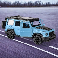 Mô Hình Xe Mẹc g63 xanh trời  tỉ lệ 1:43 Hợp kim có thể mở cửa - bánh sau chạy cót - Dài 11.4cm - rộng 4.5cm - cao 4.7cm - FULL BOX : box màu SKU : oto552h - (VAT: 003-01-35) - K54-T3-S2