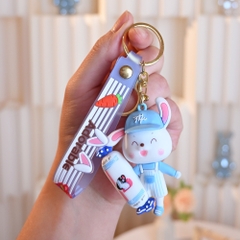 móc khóa thỏ xanh cầm kẹo  - dây dài 11cm mô hình cao 7.5cm - nặng : 50gram - boc túi - no box n3-k17-t5-s3
