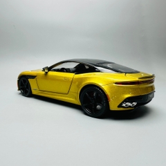 Mô Hình Xe aston martin vàng 1:22 Hợp kim có thể mở cửa - bánh sau chạy cót - Có tiếng - đèn pha sáng - Dài 20cm - rộng 9cm - cao 6cm - nặng ~ 1000gram - FULL BOX : box màu SKU : oto142