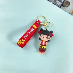 móc khóa natra đứng cười - dây dài 11cm mô hình cao 7.5cm - nặng : 50gram - no box