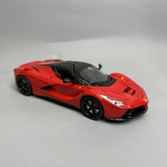 Mô Hình xe laferari đỏ tỉ lệ 1:22 Hợp kim có thể mở cửa - bánh sau chạy cót - Dài 21cm - rộng 9cm - cao 5cm - nặng : 800gram - FULL BOX : box màu SKU : oto281 n3-k7-t1-s1