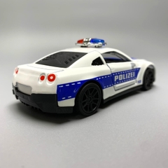 Mô Hình xe NISSAN police  GTR tỉ lệ 1:43 Hợp kim có thể mở cửa - bánh sau chạy cót - Dài 10cm - cao 3cm - nặng 200gram - Figure Oto - FULL BOX : box màu - K69-T2-S10