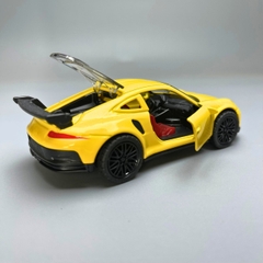 Mô Hình xe Porsche 911 màu vàng - tỉ lệ 1:36 Hợp kim có thể mở cửa - bánh sau chạy cót - Dài 12cm - rộng 5cm - cao 3.5cm - nặng : 200gram - FULL BOX : box màu - SKU : oto65 - N3-K9-T2-S3