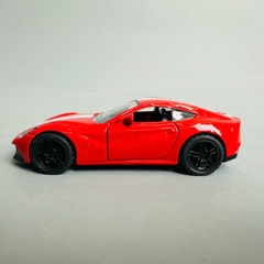Mô Hình xe Ferrari đỏ sọc trắng tỉ lệ 1:36 Hợp kim có thể mở cửa - bánh sau chạy cót - Dài 11cm - rộng 5cm - cao 4cm - nặng : 500gram - FULL BOX : box màu SKU : oto351 n3-k11-t5 - s4