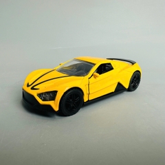 Mô Hình xe Zenvo ST1 vàng tỉ lệ 1:36 Hợp kim có thể mở cửa - bánh sau chạy cót - Dài 11cm - rộng 5cm - cao 4cm - nặng : 500gram - FULL BOX : box màu SKU : oto349 n3-k9-t3-s2