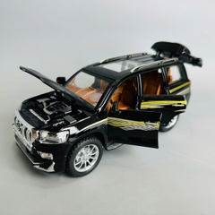Mô Hình xe Landcruiser prado đen tỉ lệ 1:24 Hợp kim có thể mở cửa - bánh sau chạy cót - Dài 21cm - cao 8cm - nặng 1000gram - Figure Oto - FULL BOX : box màu - SKU : oto396 - n3-k7-t1-s3
