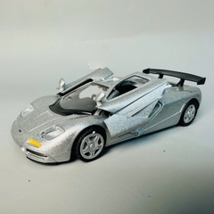Mô Hình xe mclaren f1 xám tỉ lệ 1:32 Hợp kim có thể mở cửa - bánh sau chạy cót - Dài 12cm - rộng 5cm - cao 3cm - nặng : 300gram - FULL BOX : box màu SKU : oto445 - K70-T4-S2