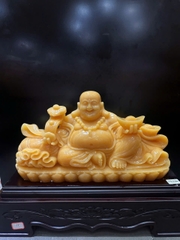 Tượng thần tài di lặc cầm gậy như ý ngọc hoàng long
