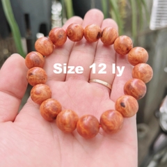 Vòng tay nu huyết long size 12ly hạt tròn