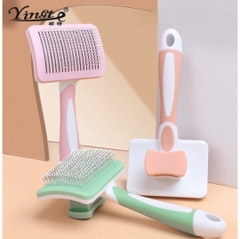 Lược chải lông thú cưng Yingte nút đẩy lông có hộp