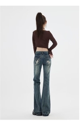Quần jeans ống loe cạp trễ cổ điển phong cách Mỹ thêu họa tiết QJ030250