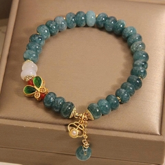 Vòng tay pha lê hạt ngọc bích xanh – Charm bướm sang trọng TS142250