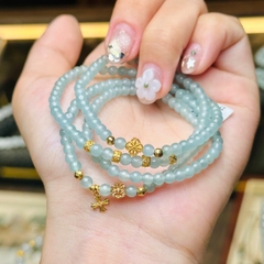 Chuỗi lam băng ngọc 4mm mix charm v18k