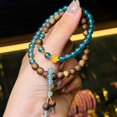 chuỗi lam băng ngọc đậm 5.8mm mix trầm chìm hải nam 6.5mm charm v24k