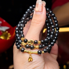 Thạch anh tóc đen 5.6li mix charm bạc mạ