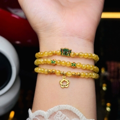 Thạch anh tóc vàng 5li mix charm bạc mạ