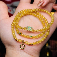 Thạch anh tóc vàng 5li mix charm bạc mạ