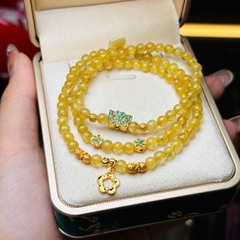 Thạch anh tóc vàng 5li mix charm bạc mạ