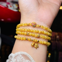 Thạch anh tóc vàng 5li mix charm bạc mạ