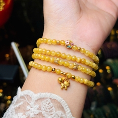 Thạch anh tóc vàng 5li mix charm bạc mạ