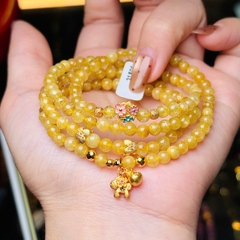 Thạch anh tóc vàng 5li mix charm bạc mạ