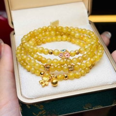 Thạch anh tóc vàng 5li mix charm bạc mạ