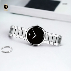Đồng Hồ Nữ Movado Quartz 0607288 Dây Thép Trắng Mặt Đen.