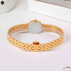 Đồng Hồ Nữ Tissot Quartz Lovely Dây Thép Vàng Hồng Mặt Trắng Sapphire T058.009.33.031.01 ( T0580093303101 )