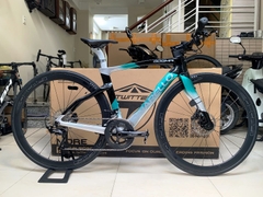 ROAD BIKE tay lái ngang PINA F14, Khung carbon - vành nhôm, groupsets  Shimano 105. Thắng đĩa dầu