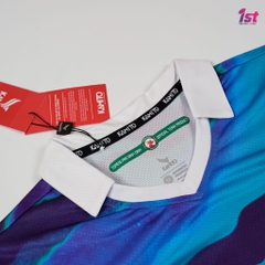 Áo thi đấu Topenland Bình Định 2022 màu xanh loang