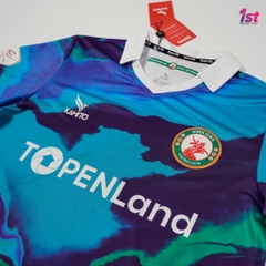 Áo thi đấu Topenland Bình Định 2022 màu xanh loang
