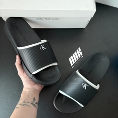 Calvin Klein Slide Rubber Neoprene Text / Black ( YM01234-0GM )