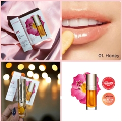 Son dưỡng Clarins Paris 01 Honey Lip Comfort Oil 1.4ml