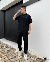 Áo polo đen