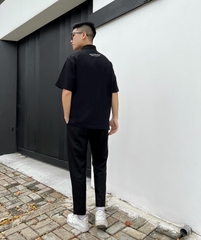 Áo polo đen