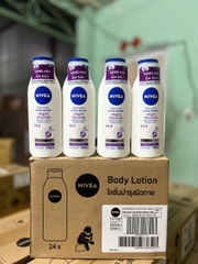 98925 SỮA DƯỠNG THỂ DƯỠNG TRẮNG DA BAN ĐÊM 190ML ( TÍM ) x 24 CHAI