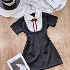 Đầm xoè cổ yếm đính nơ đỏ