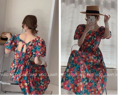 Đầm hoa cam cổ vông dây lưng tay bồng