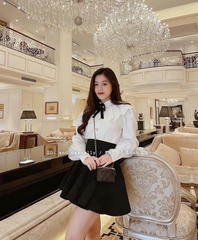 Áo sơ mi  trắng xếp ly cổ đính nơ