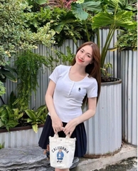 A581- Áo xuất thêu gấu cúc trước có tem gáy 4 màu