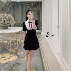 Đầm xoè cổ yếm đính nơ đỏ