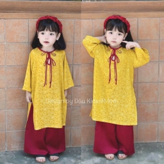 SETKIS061-Set áo dài bé gái màu vàng viền đỏ chất lụa kèm mấn