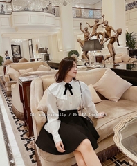 Áo sơ mi  trắng xếp ly cổ đính nơ