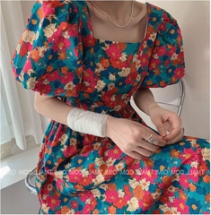 Đầm hoa cam cổ vông dây lưng tay bồng