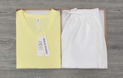 SET1003- Set áo đũi vàng phối quần short trắng
