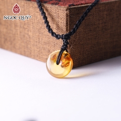 Mặt dây chuyền đồng điếu đá hổ phách vàng